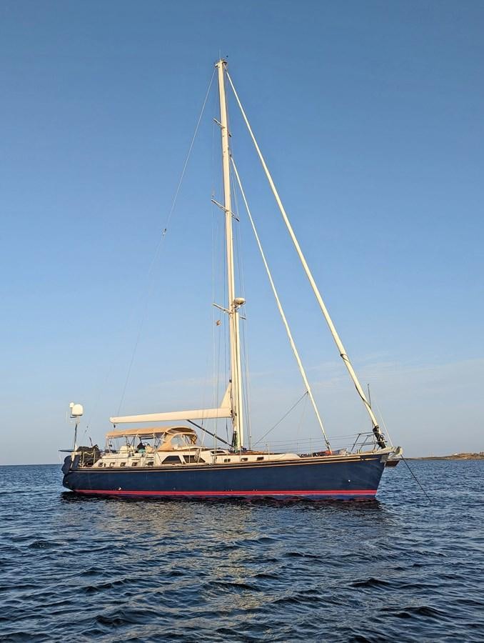 a sailboat on the water aboard LUCKY B Yacht for Sale