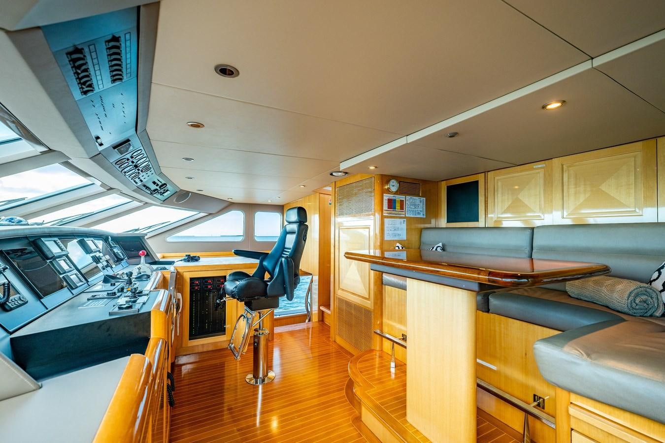 inside of a building with tables and chairs aboard SEAQUEST Yacht for Sale