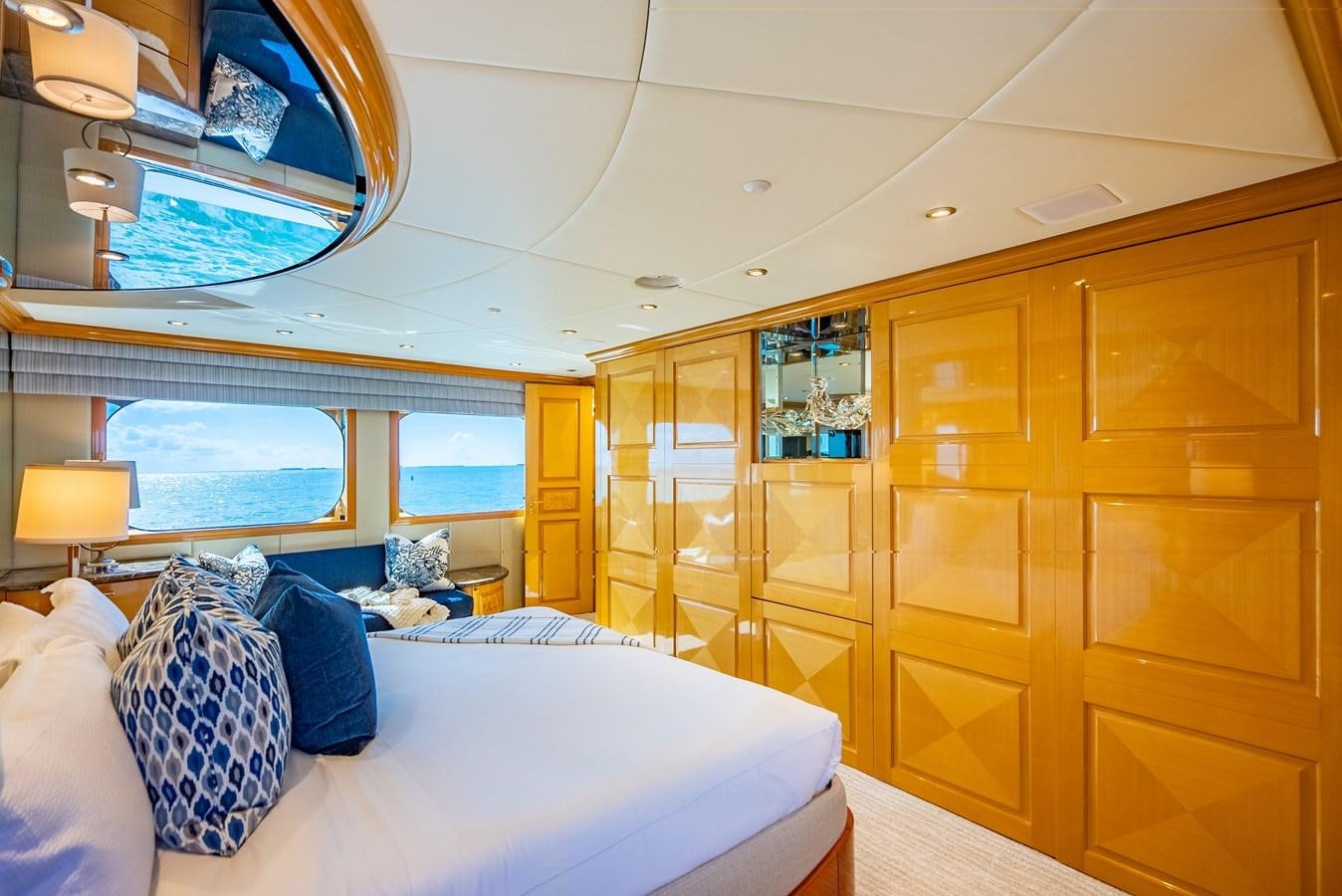 a room with a bed and a large closet aboard SEAQUEST Yacht for Sale
