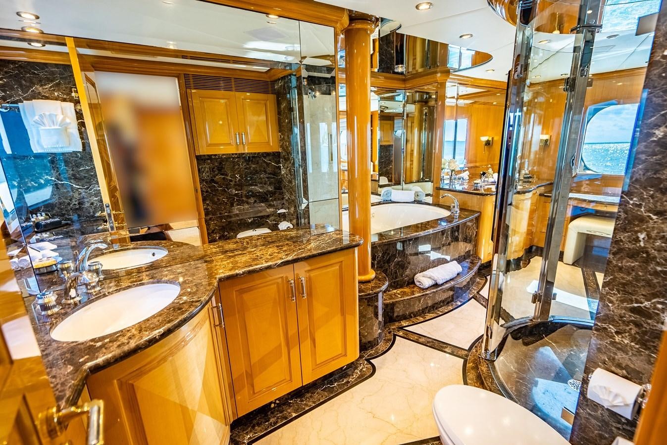 a bathroom with a large mirror aboard SEAQUEST Yacht for Sale