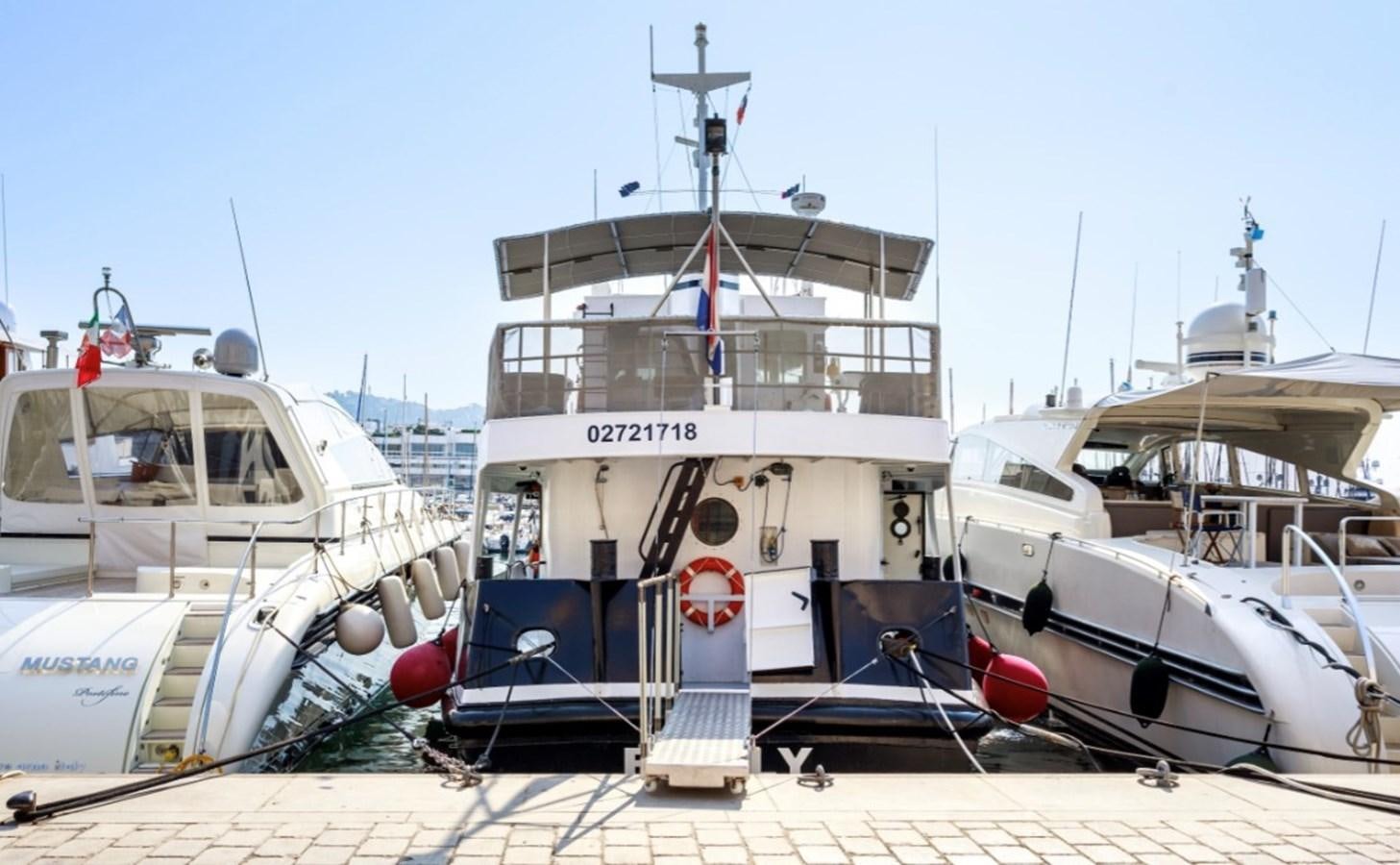 boats docked at a pier aboard FAMILY Yacht for Sale