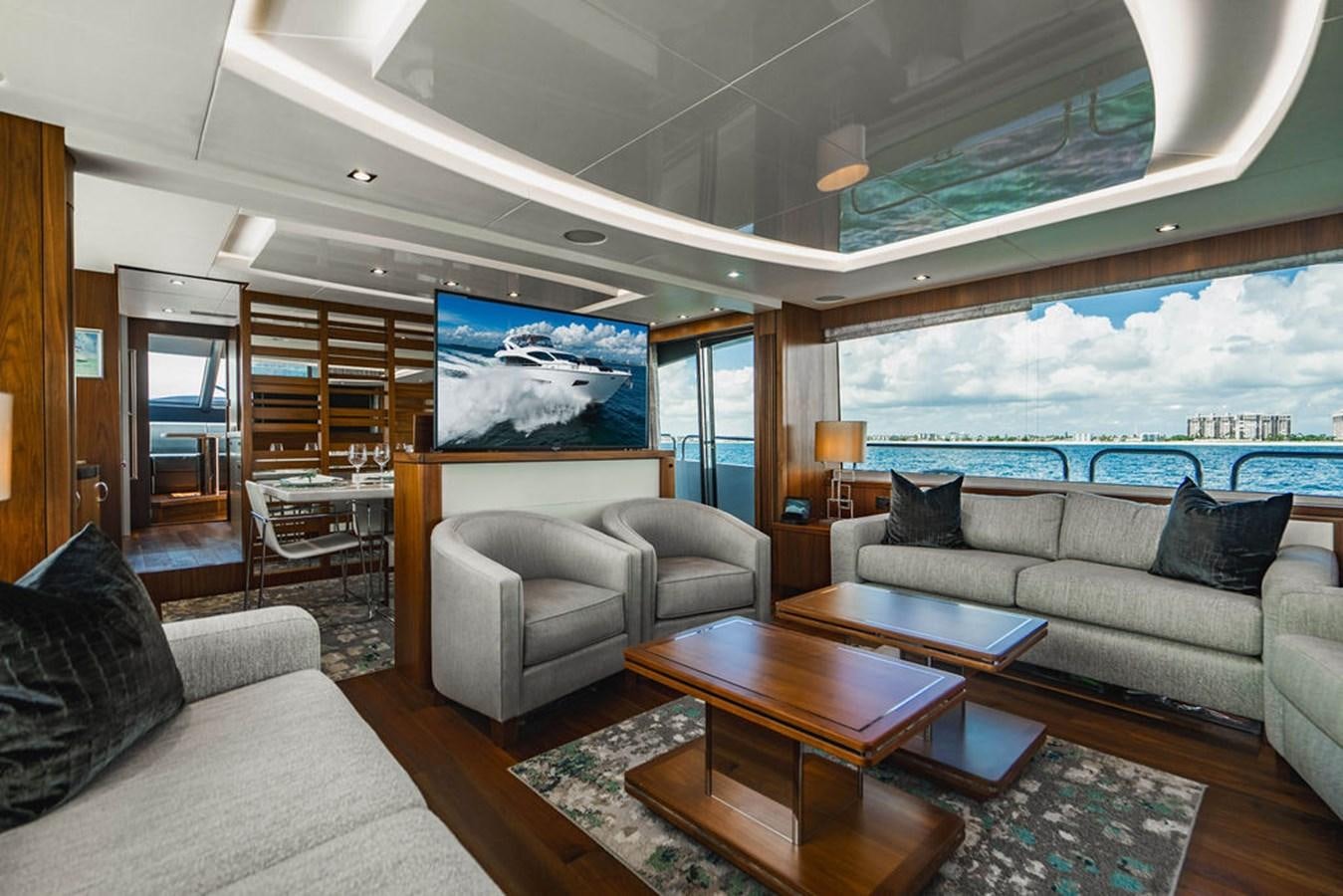 a living room with a large window aboard GALLIVANT Yacht for Sale