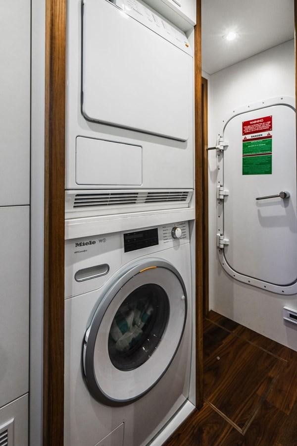 a washer and dryer in a room aboard GALLIVANT Yacht for Sale