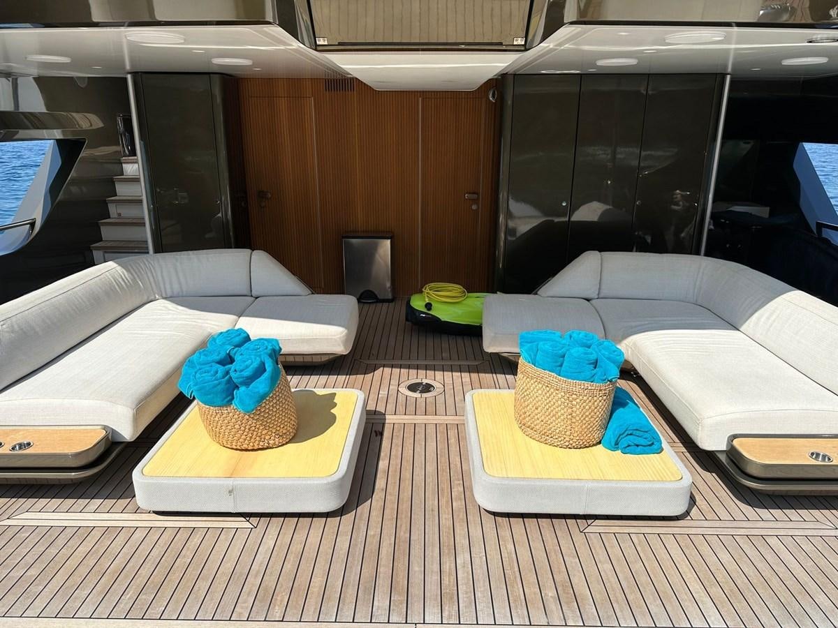 a table with a cake and a cupcake on it aboard NG Yacht for Sale