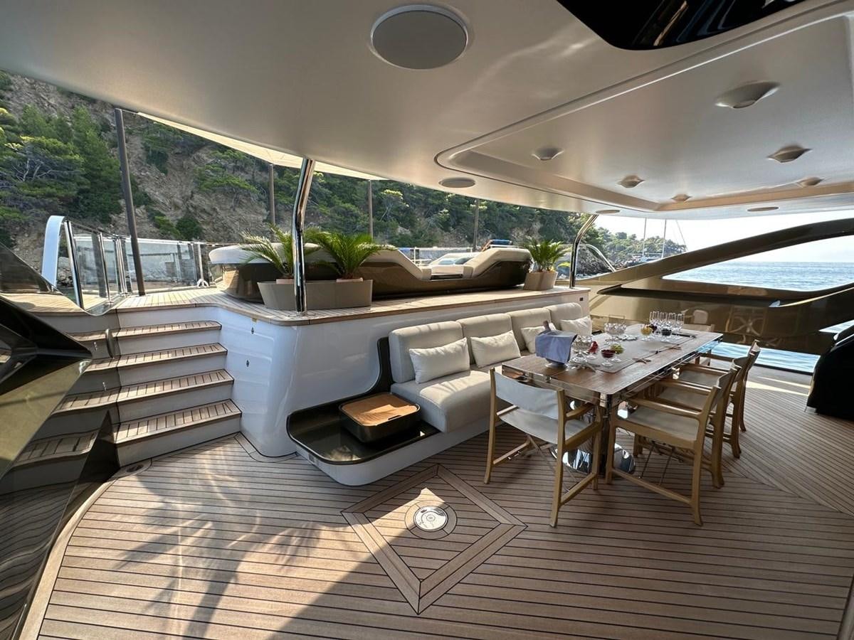 a room with a couch and a table aboard NG Yacht for Sale