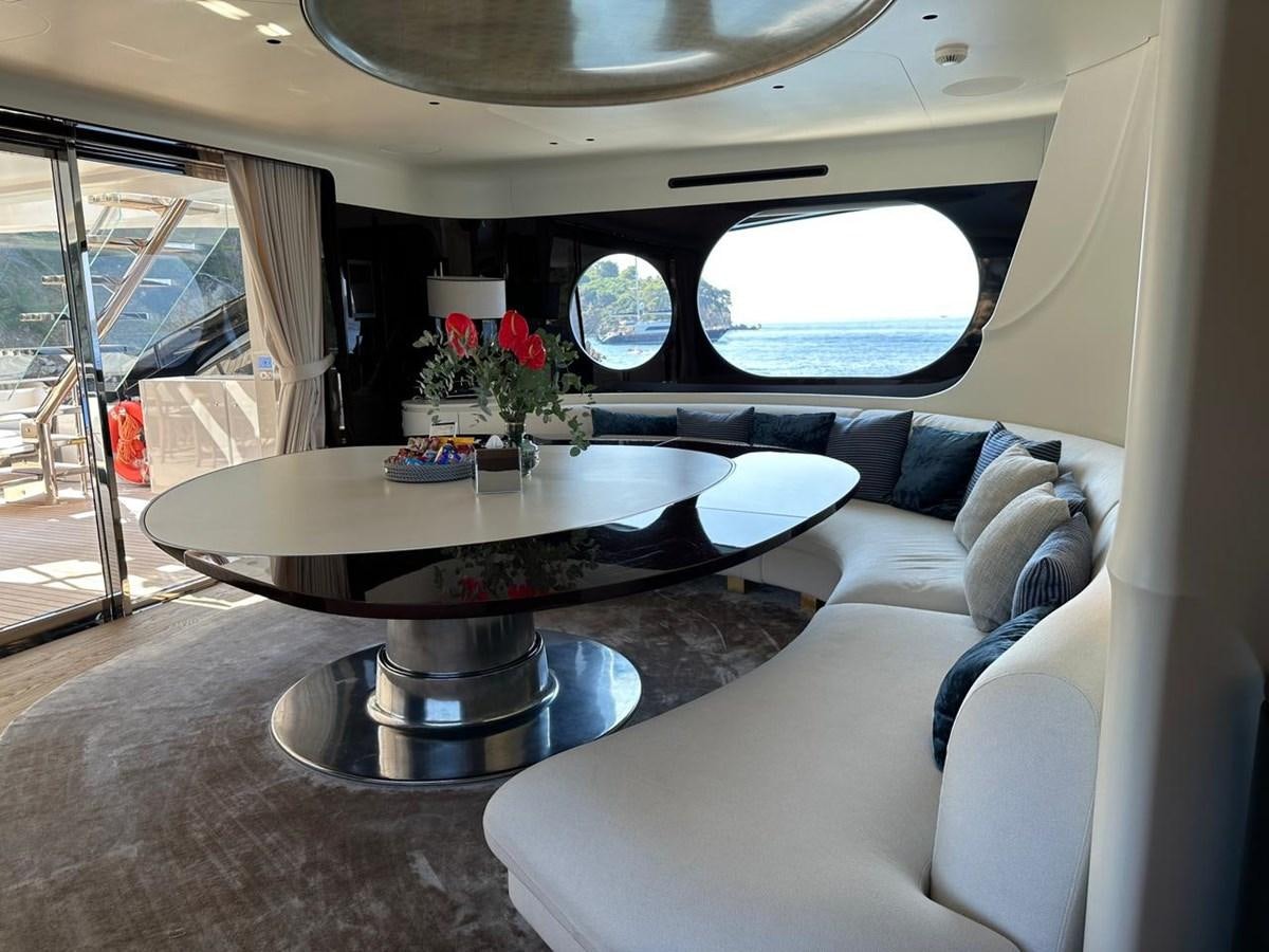 a table with a glass table aboard NG Yacht for Sale