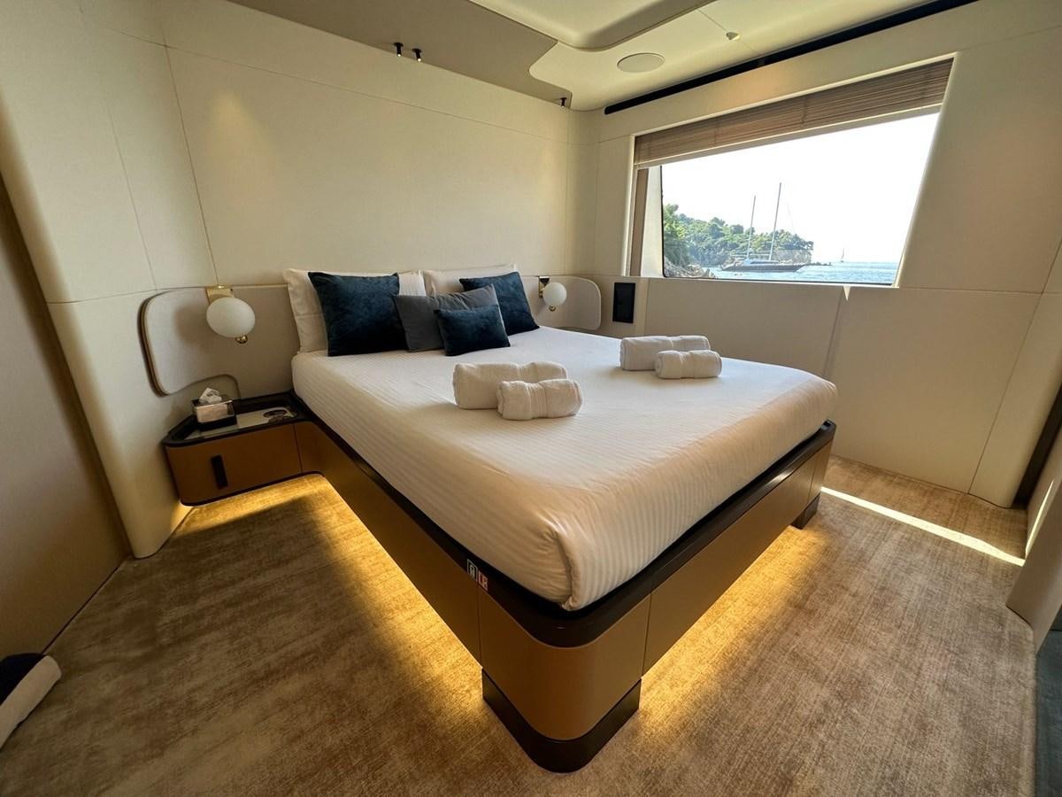 a bed in a room aboard NG Yacht for Sale