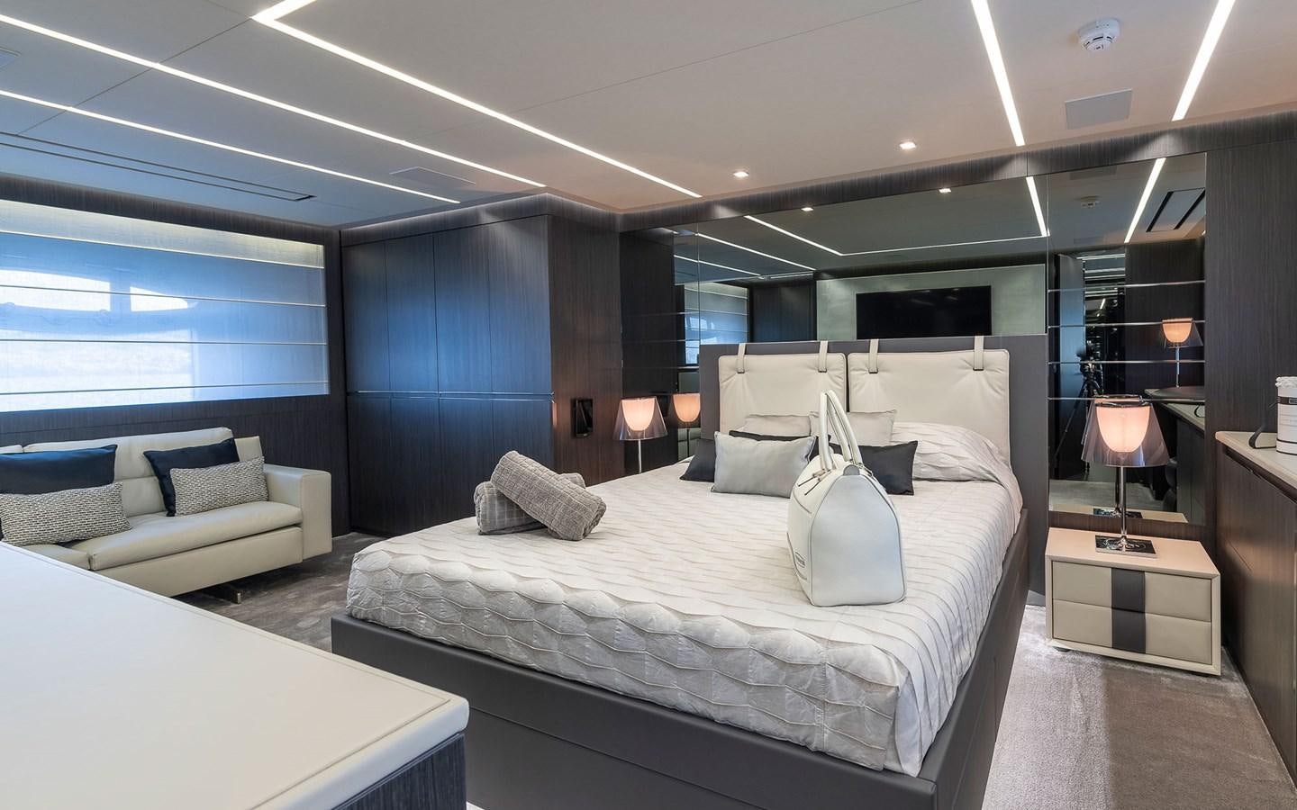 a large bed in a room aboard ALDEBARAN III Yacht for Sale