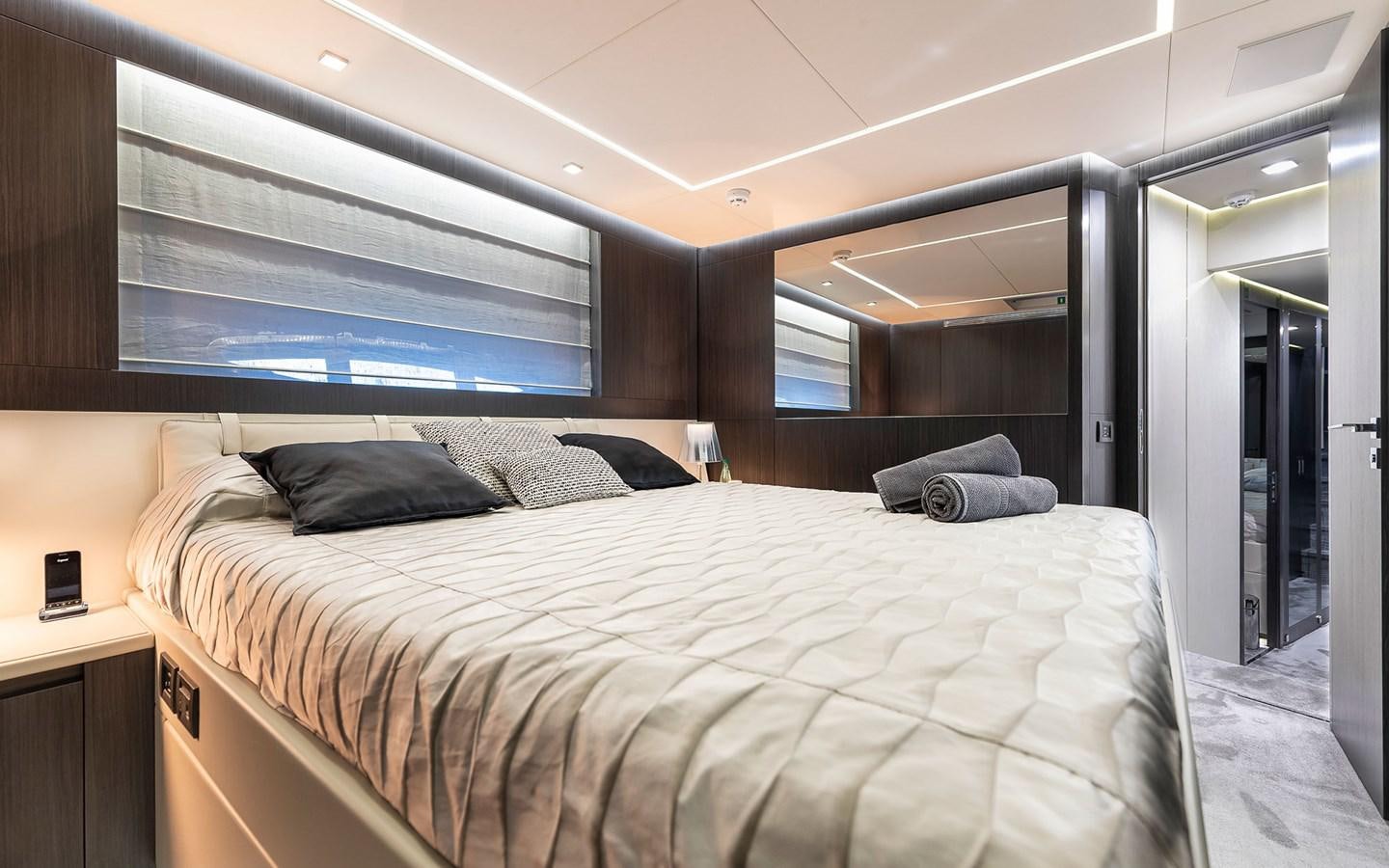 a bed in a room aboard ALDEBARAN III Yacht for Sale