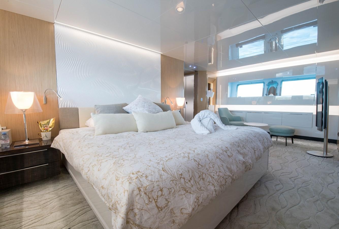 a large bed in a room aboard NIGHT FURY Yacht for Sale