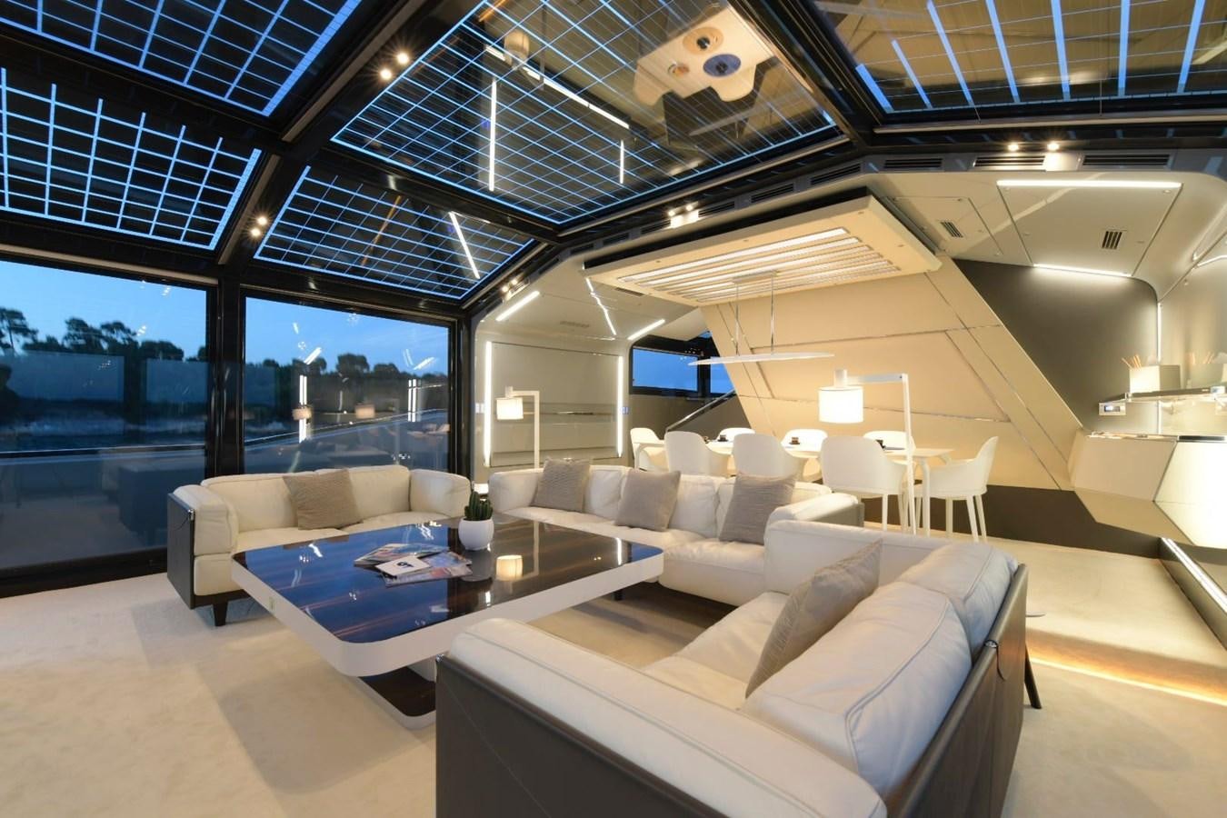 a living room with a large window aboard NIGHT FURY Yacht for Sale