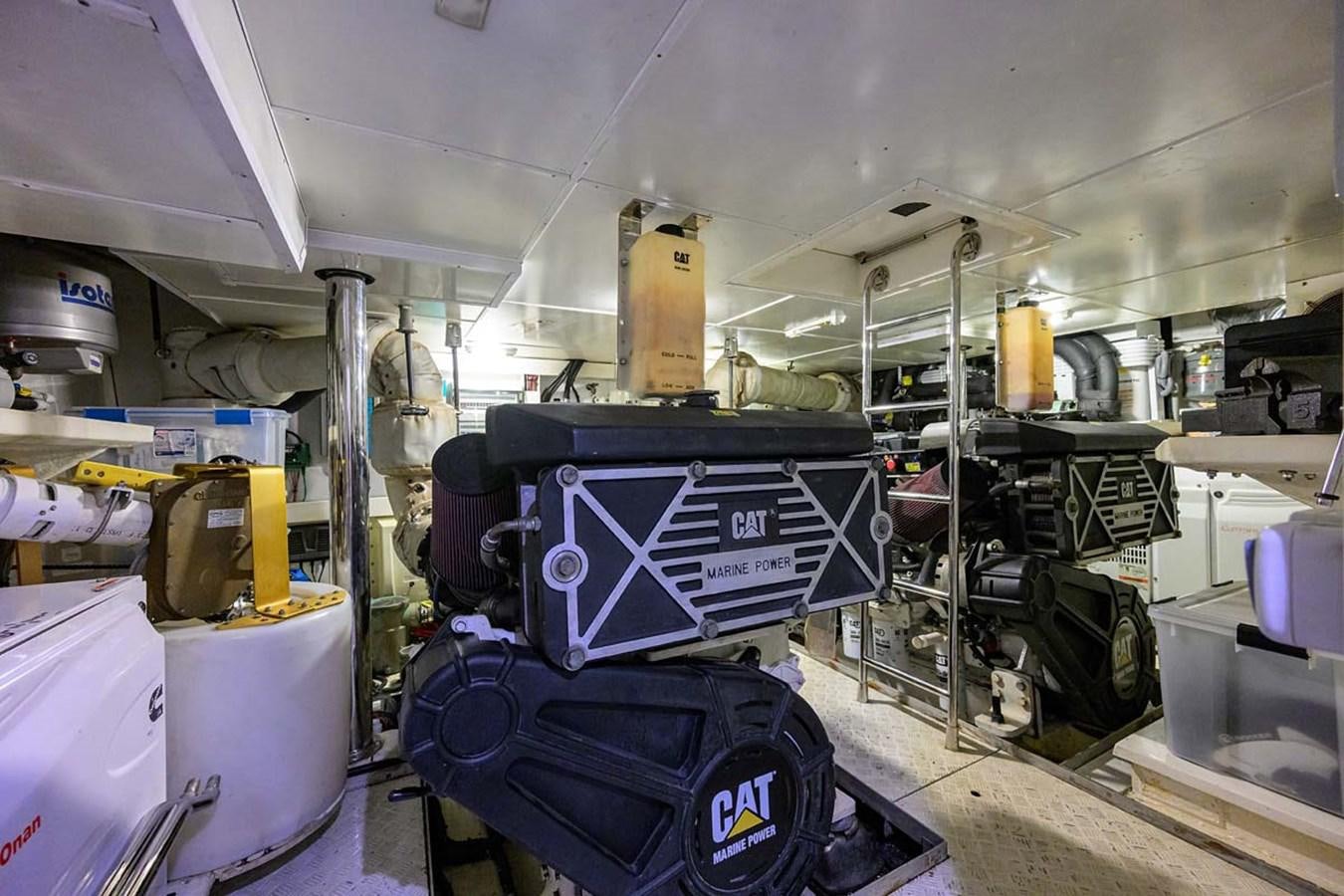 a large machine with a large blue box on the side aboard XHALE Yacht for Sale