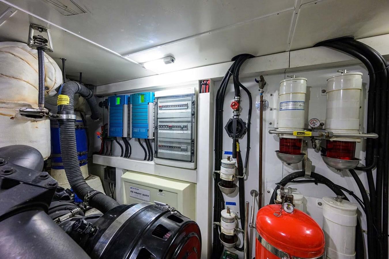 a room with machinery and pipes aboard XHALE Yacht for Sale