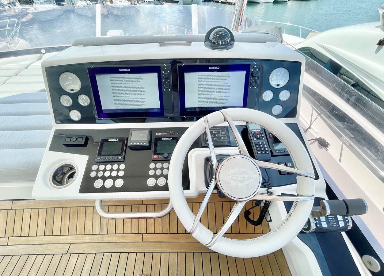 a car with a screen and buttons aboard EXCELLENCE Yacht for Sale