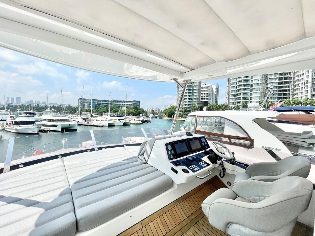 a boat in a harbor aboard EXCELLENCE Yacht for Sale