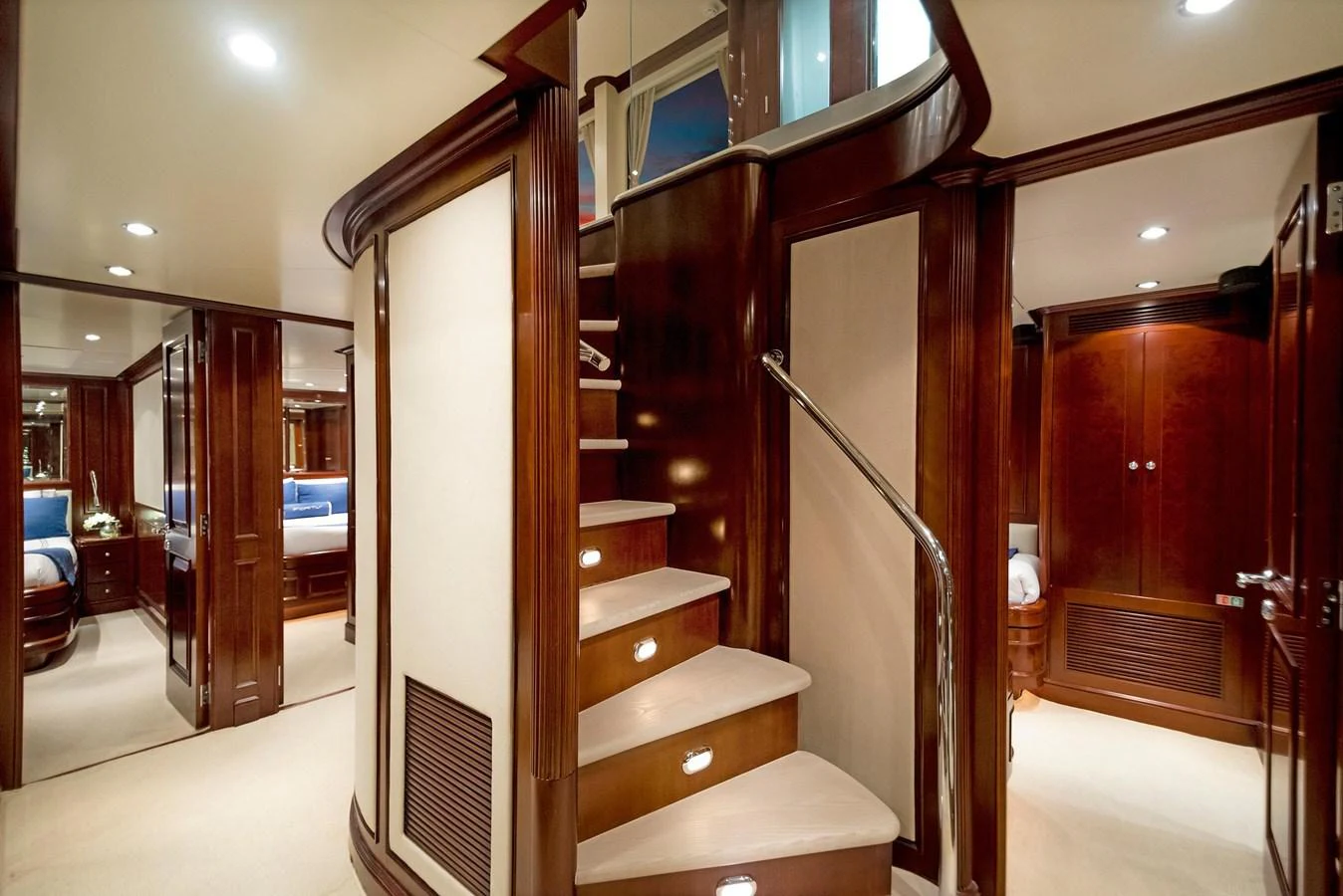 a room with a staircase and a window aboard GITANA Yacht for Sale