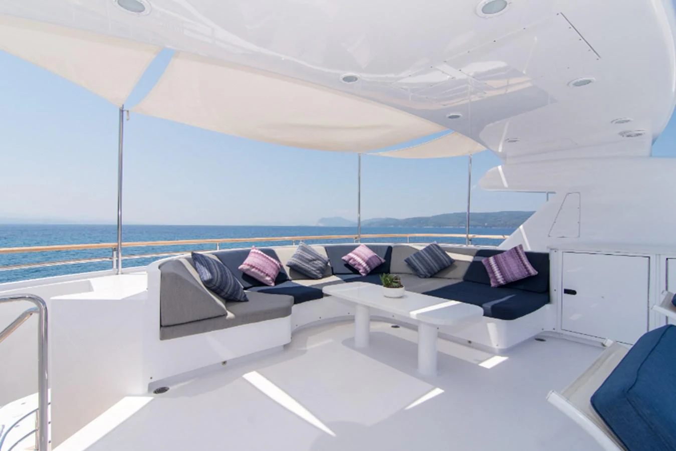 a room with a large window overlooking the ocean aboard 4*PUPPIES Yacht for Sale