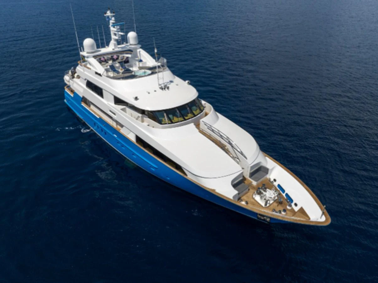 a white boat in the water aboard 4*PUPPIES Yacht for Sale