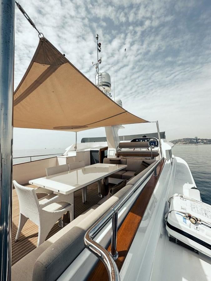 a boat with a canopy aboard LAZIZA Yacht for Sale