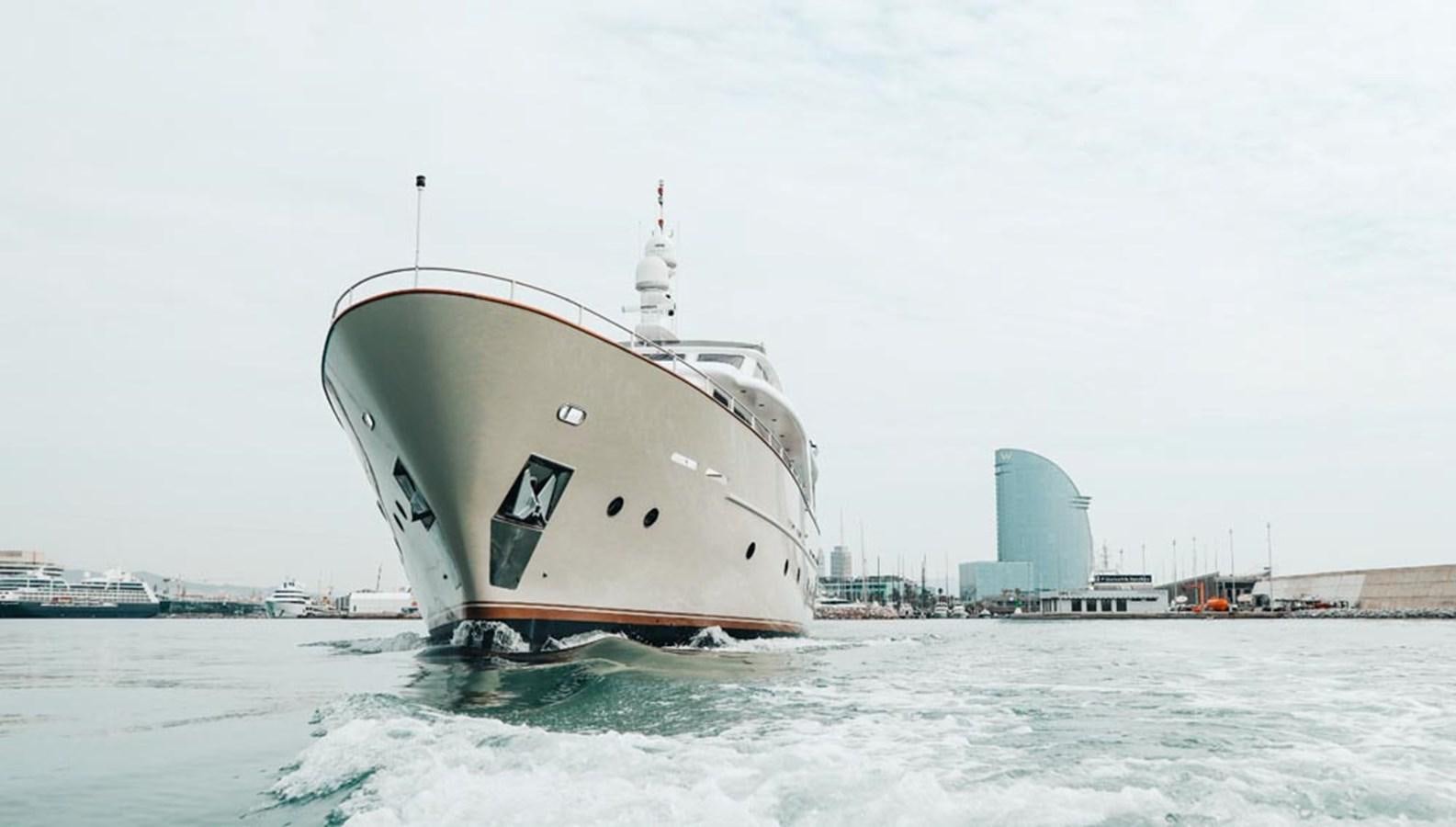 a large ship in the water aboard LAZIZA Yacht for Sale