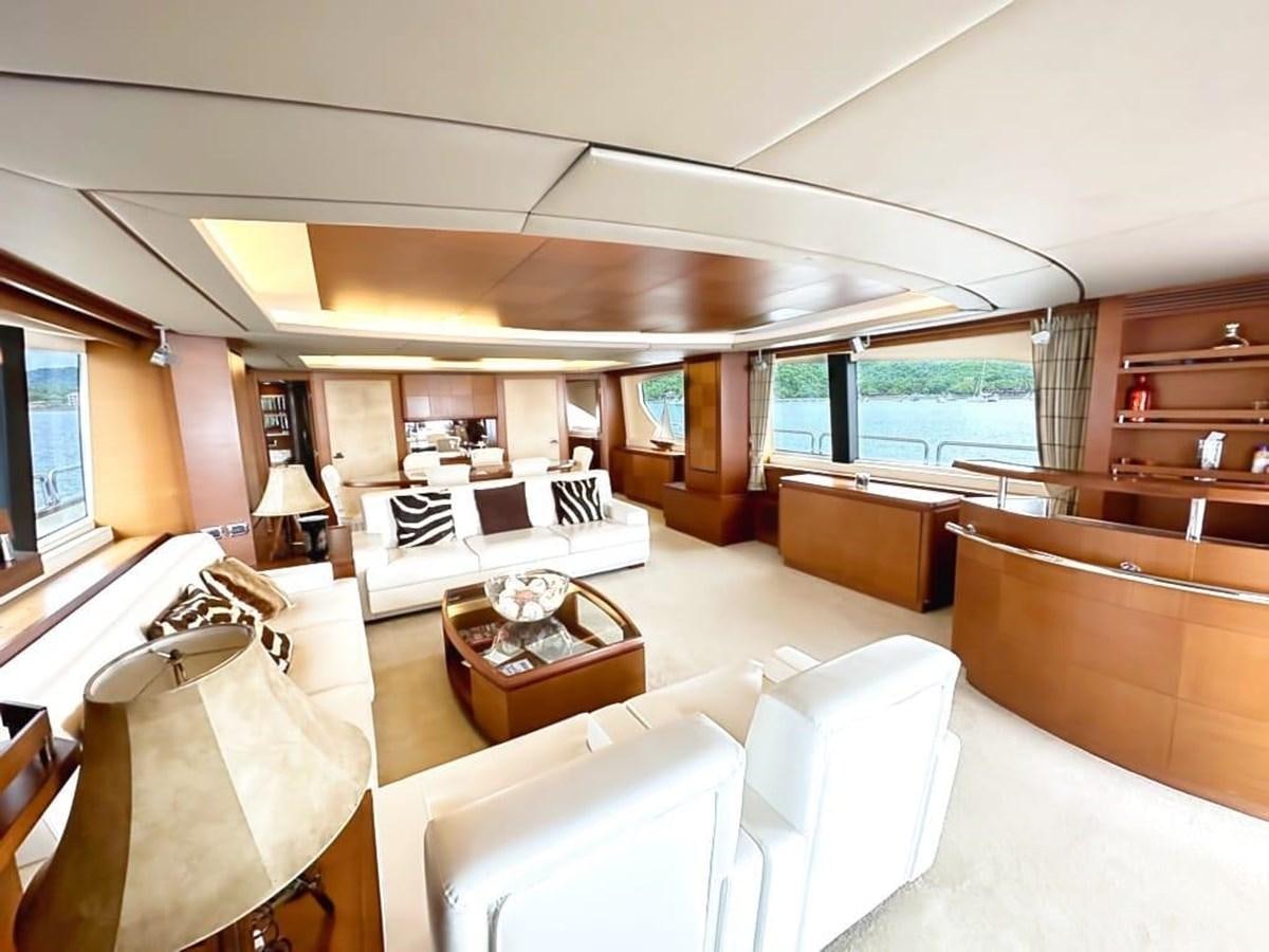 a room with a bed and a table aboard AZIMUT 116/32 Yacht for Sale