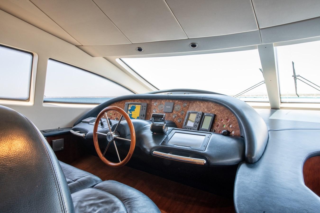 the interior of a car aboard TIME OUT OF LONDON Yacht for Sale