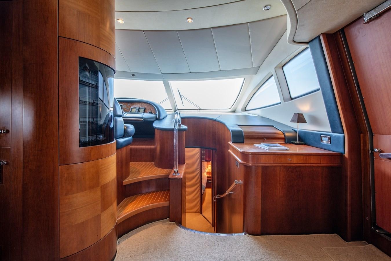 a car on a wooden platform aboard TIME OUT OF LONDON Yacht for Sale