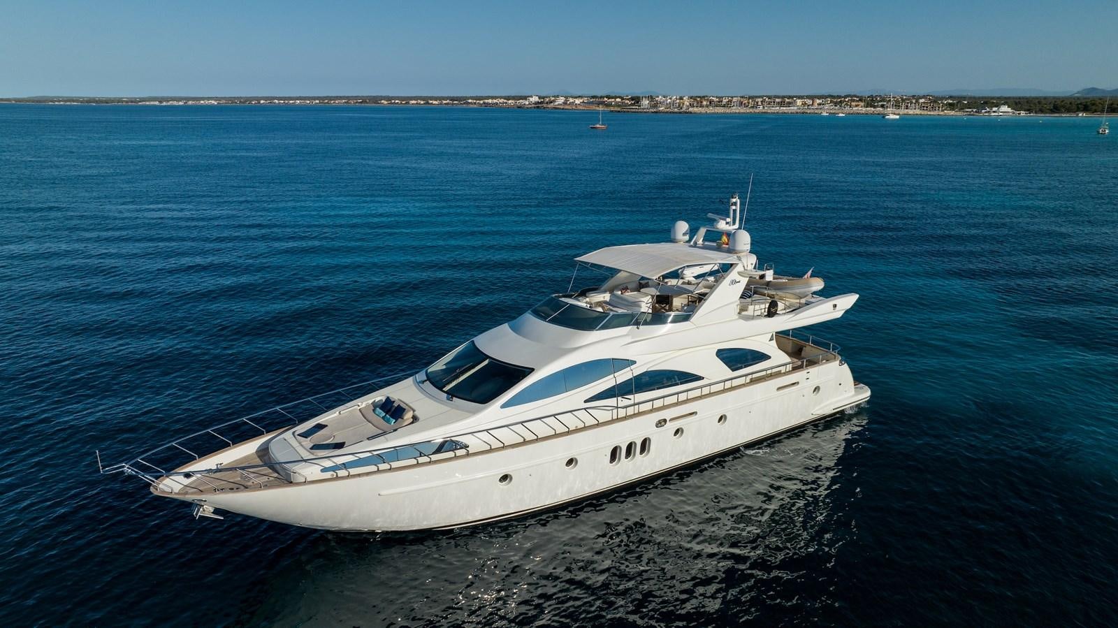 a white yacht on the water aboard TIME OUT OF LONDON Yacht for Sale