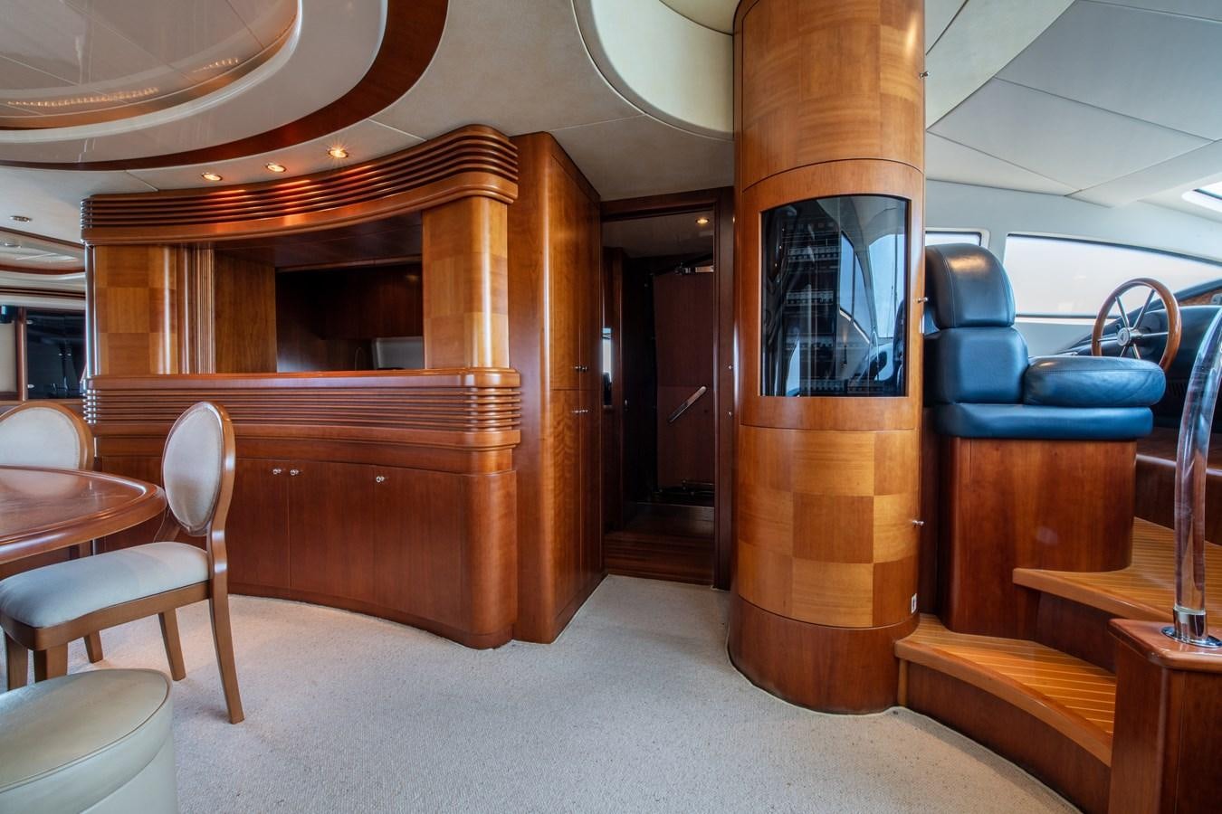 a wood cabinet in a room aboard TIME OUT OF LONDON Yacht for Sale
