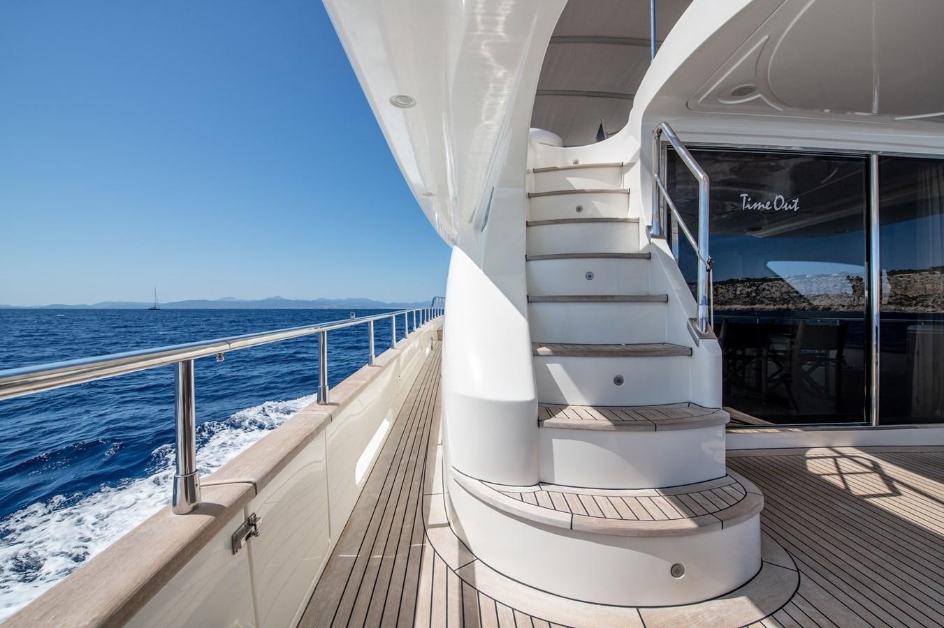 a white staircase on a boat aboard TIME OUT OF LONDON Yacht for Sale