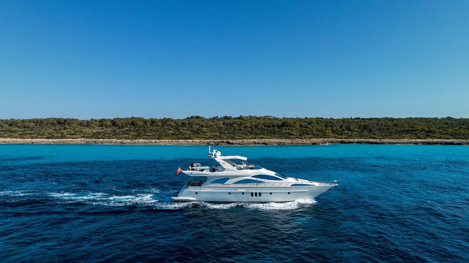 a white boat on the water aboard TIME OUT OF LONDON Yacht for Sale