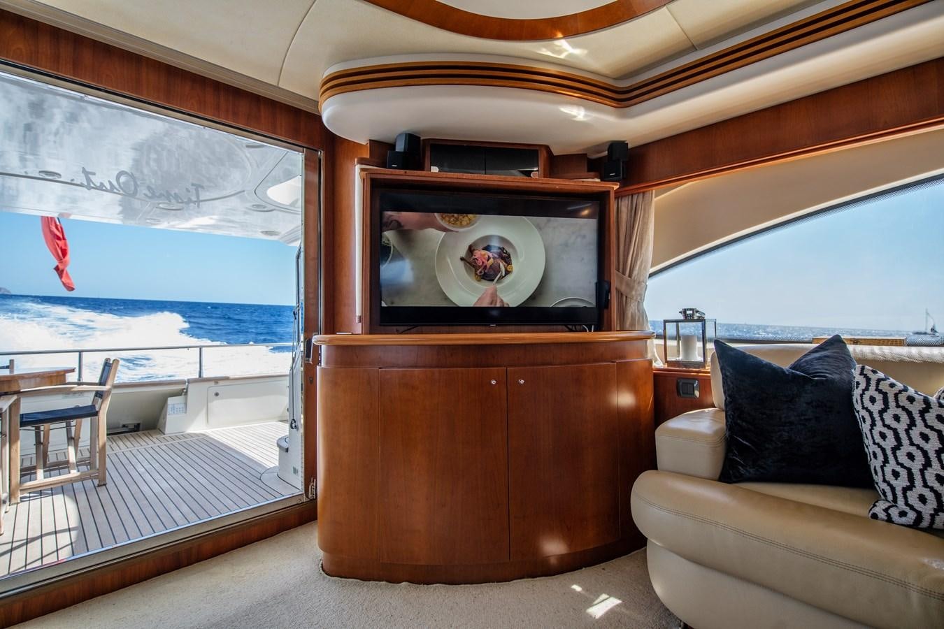 a wood cabinet in a room aboard TIME OUT OF LONDON Yacht for Sale