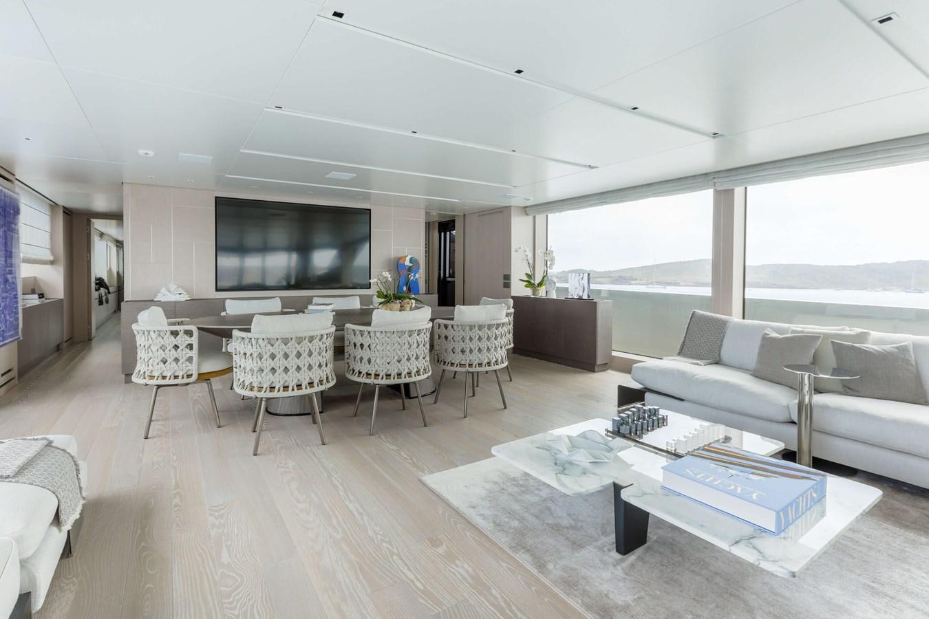 a living room with a large window aboard 2022 SANLORENZO SL120A Yacht for Sale