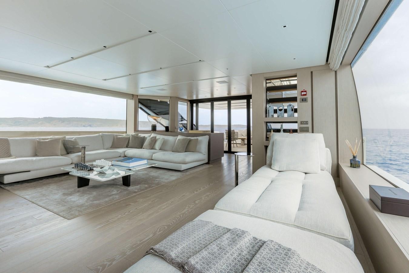 a living room with a large window aboard 2022 SANLORENZO SL120A Yacht for Sale