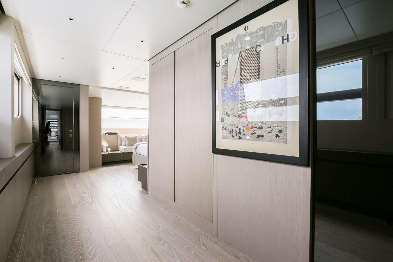 a room with a large poster on the wall aboard 2022 SANLORENZO SL120A Yacht for Sale