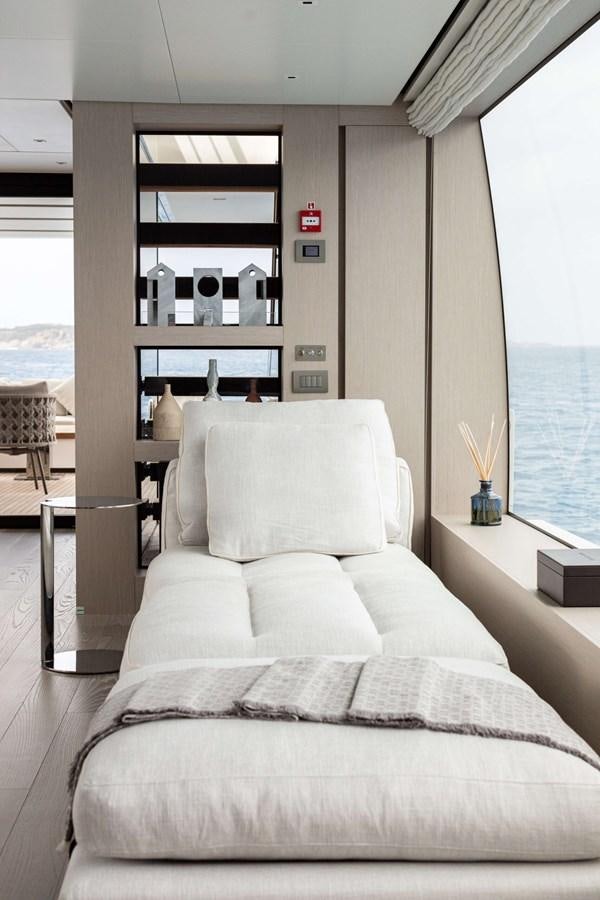 a couch in a room aboard 2022 SANLORENZO SL120A Yacht for Sale