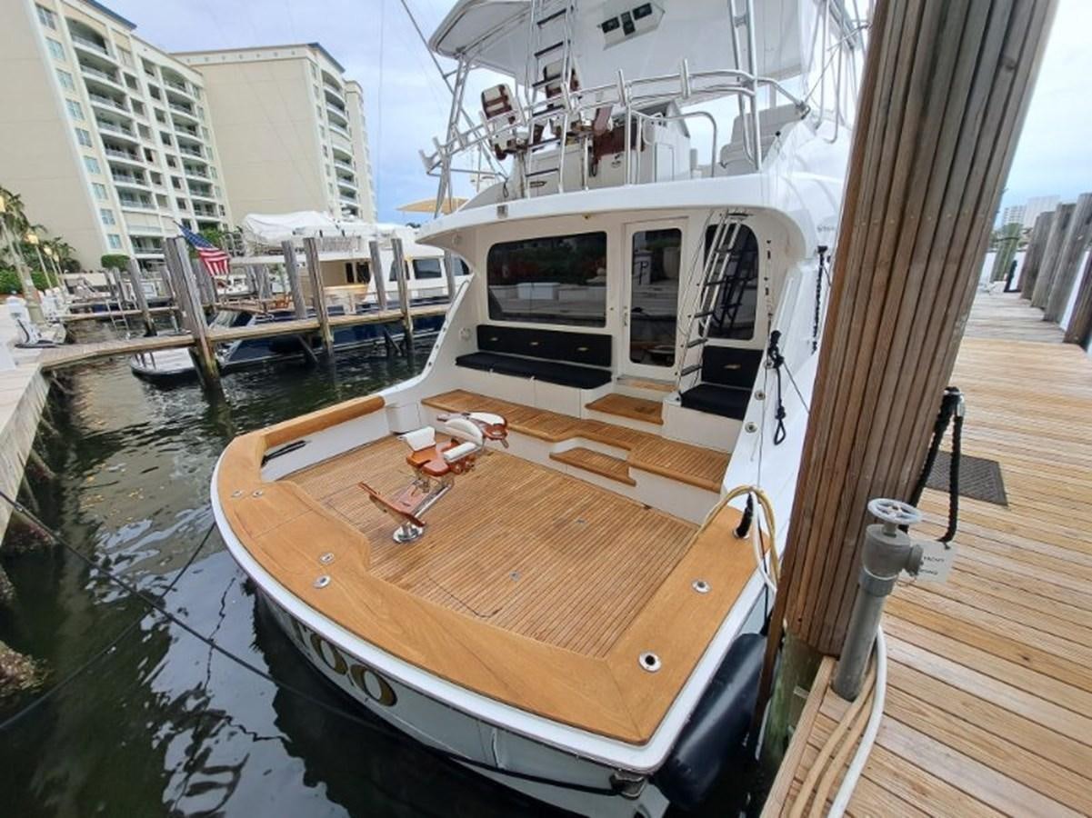 a boat docked at a pier aboard CLAIRE TOO Yacht for Sale