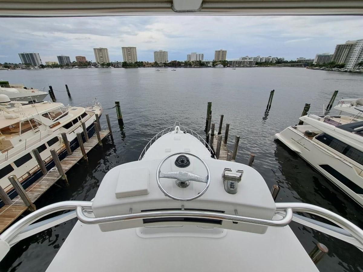 a view of a city from a boat aboard CLAIRE TOO Yacht for Sale