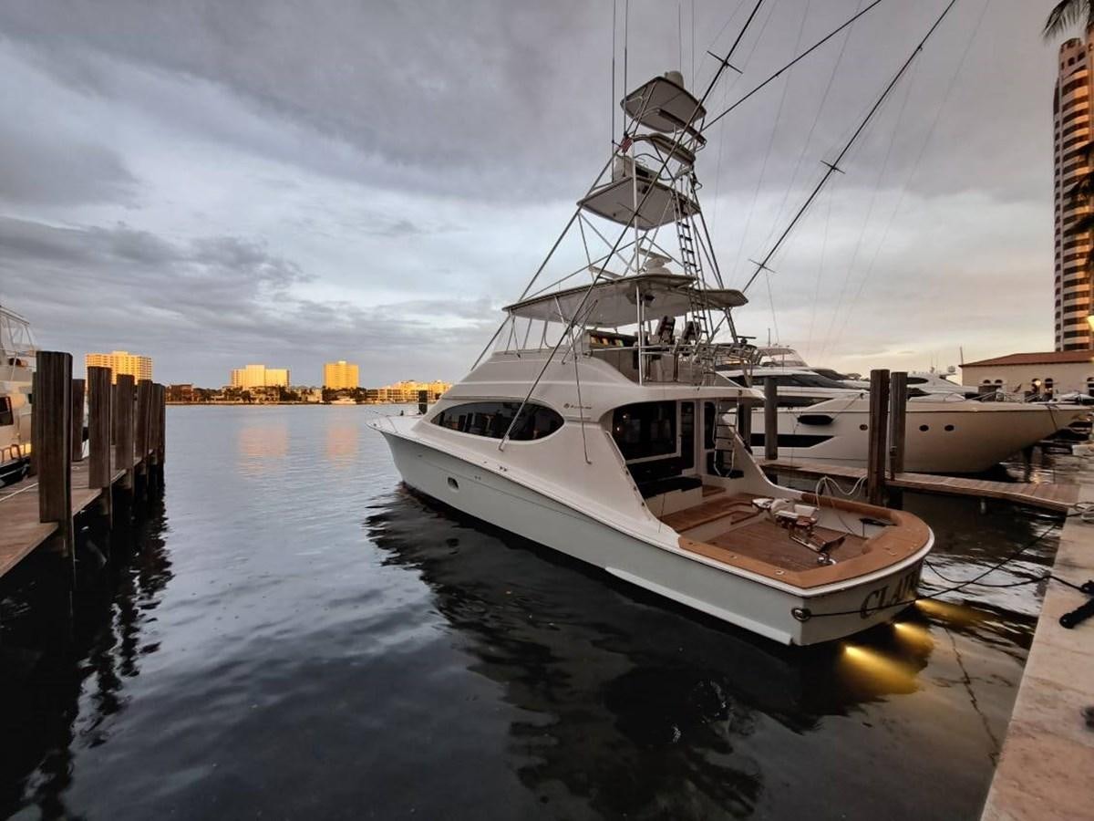 a boat docked at a pier aboard CLAIRE TOO Yacht for Sale