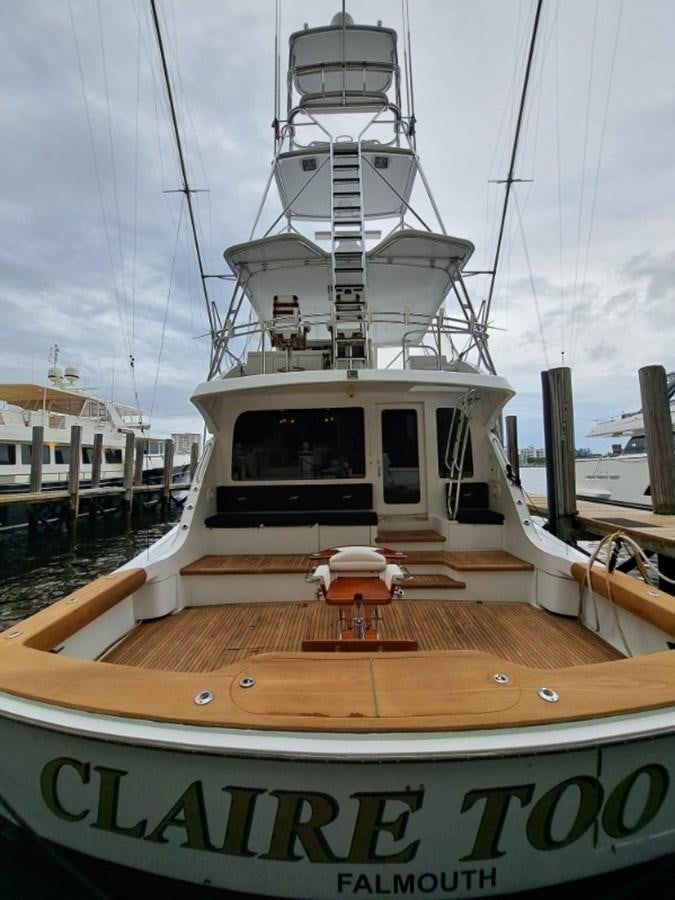 a boat docked at a pier aboard CLAIRE TOO Yacht for Sale