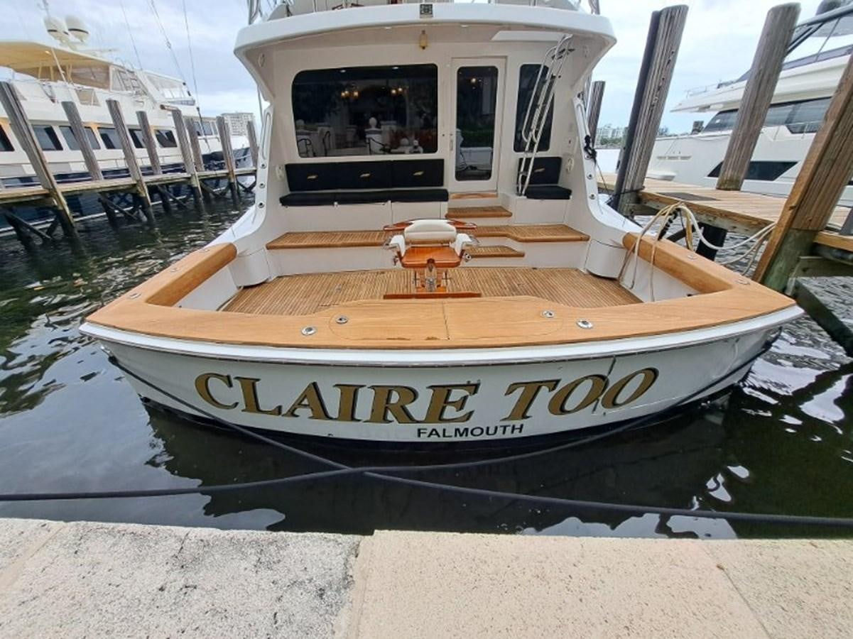 a boat docked at a pier aboard CLAIRE TOO Yacht for Sale