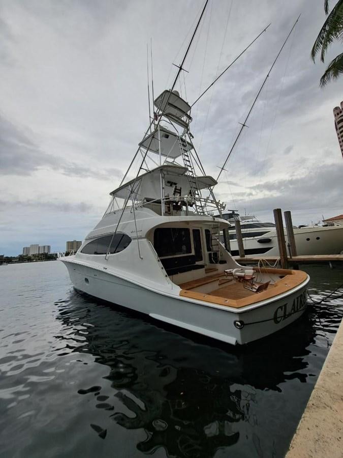 a boat docked at a pier aboard CLAIRE TOO Yacht for Sale