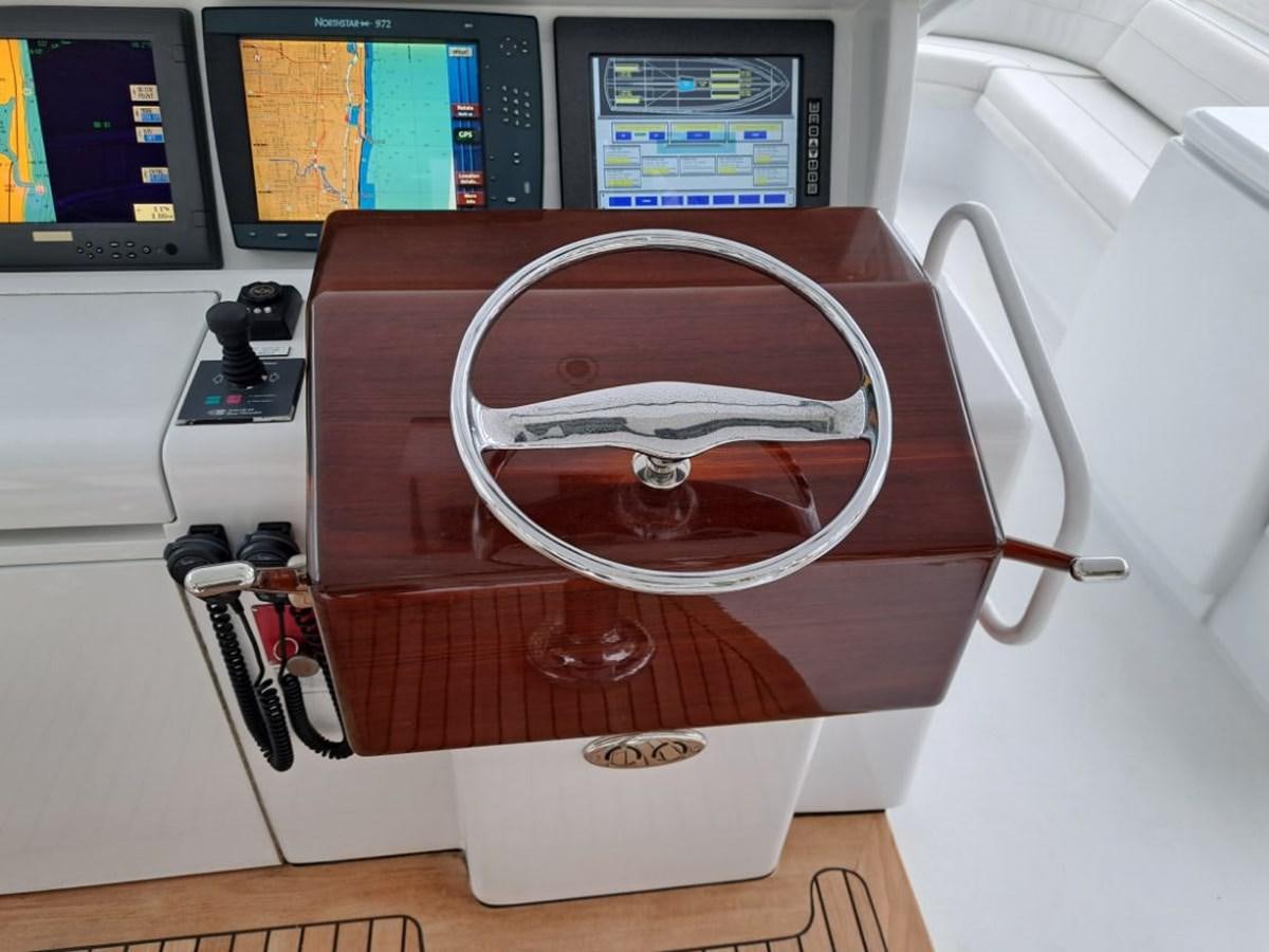 a white box with wires and a black box with a white lid aboard CLAIRE TOO Yacht for Sale