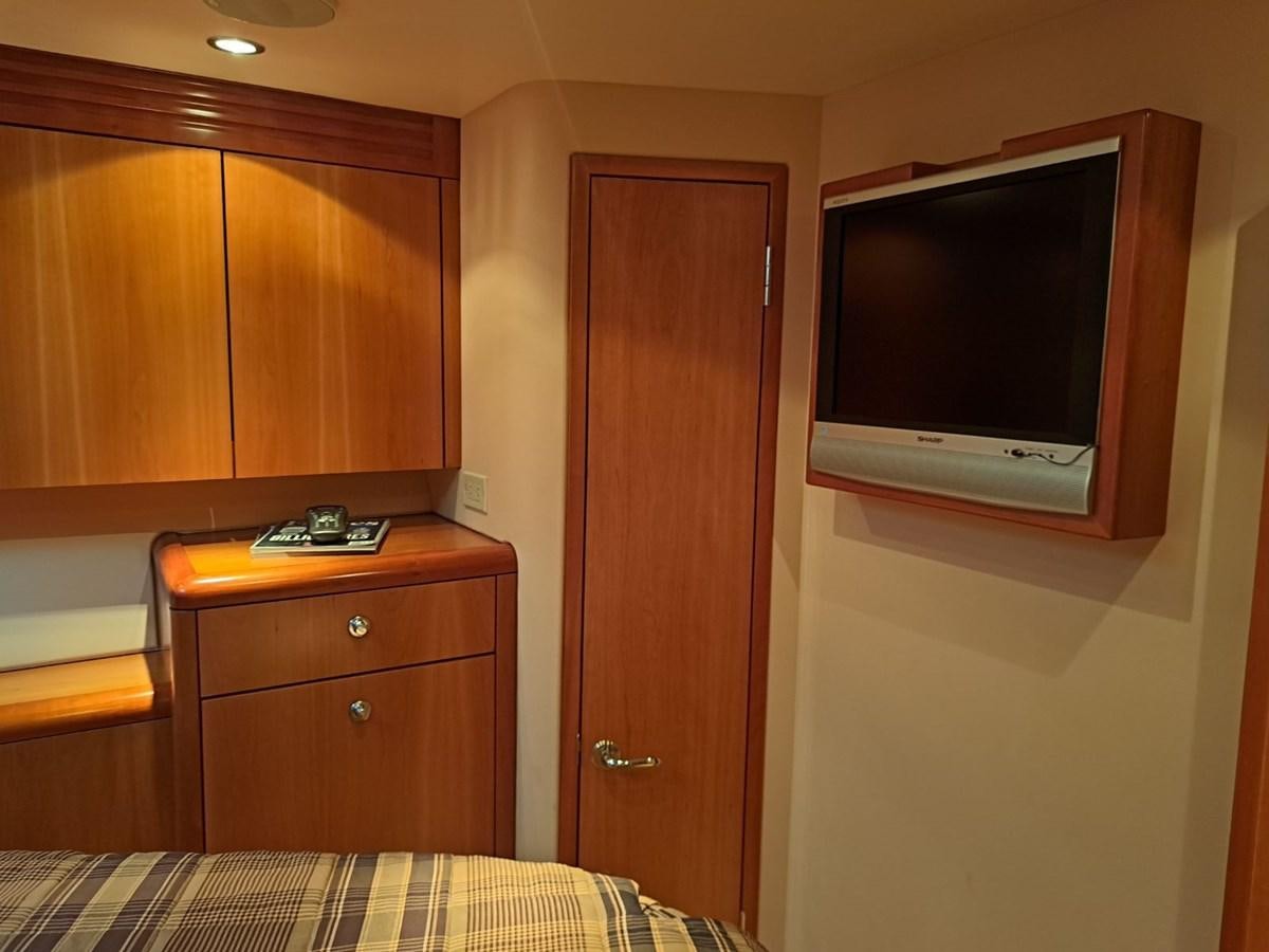 a tv on a wall aboard CLAIRE TOO Yacht for Sale