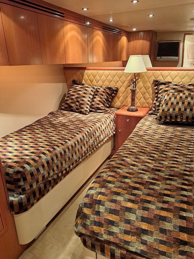 a couple of beds in a hotel room aboard CLAIRE TOO Yacht for Sale