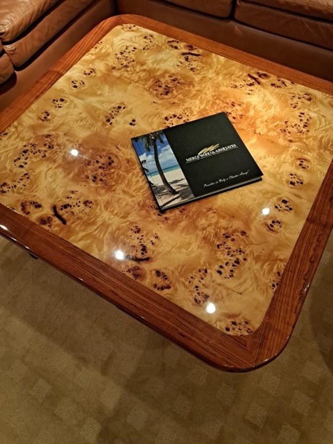 a tablet on a table aboard CLAIRE TOO Yacht for Sale