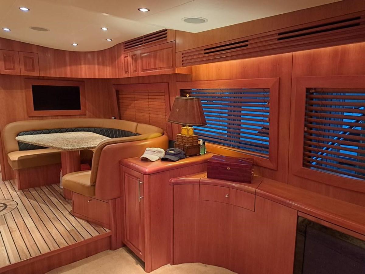 a bedroom with a bed and desk aboard CLAIRE TOO Yacht for Sale