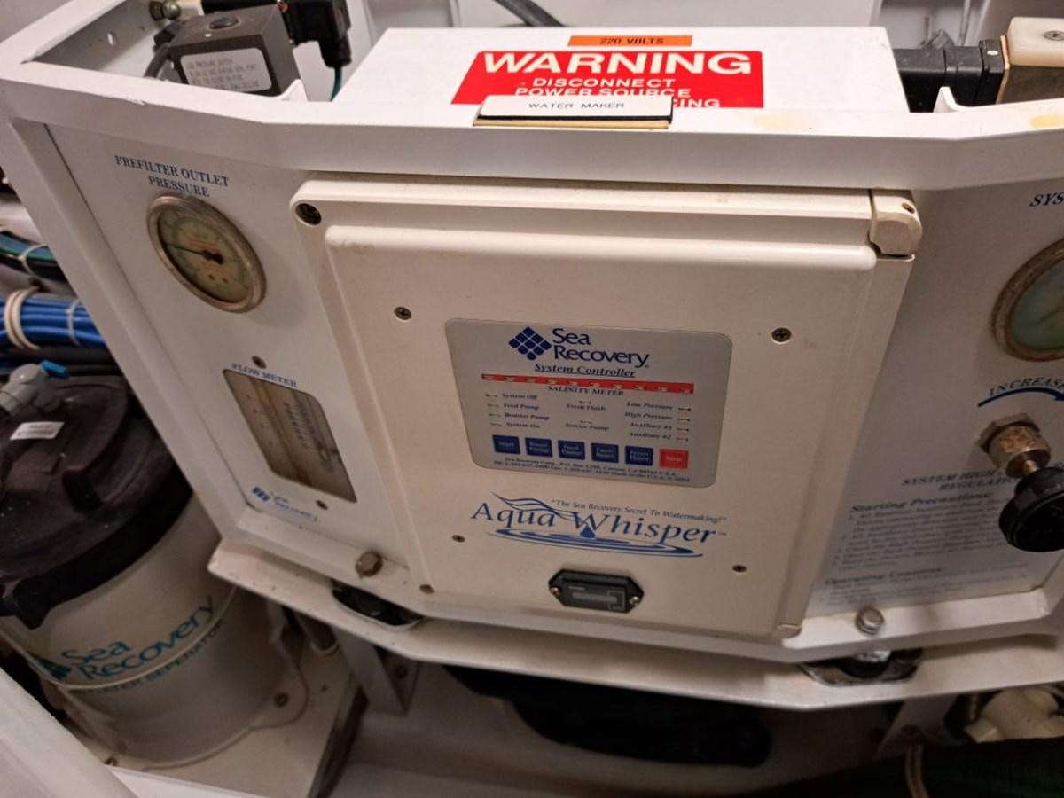 a white machine with a label aboard CLAIRE TOO Yacht for Sale