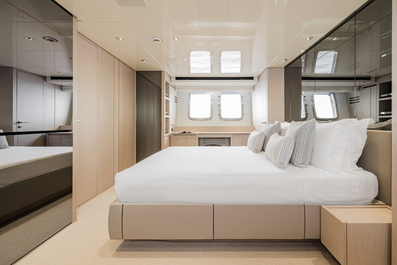 a bed in a room aboard RADKAT Yacht for Sale