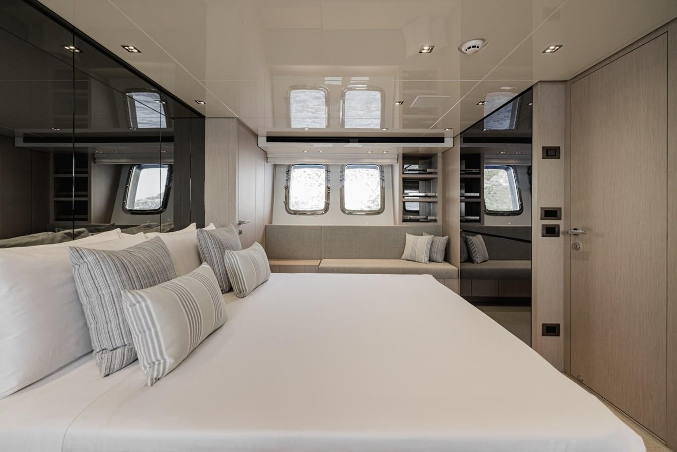 a bed in a room aboard RADKAT Yacht for Sale